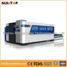 चीन 2000W Fiber Laser Cutting machine with exchanger working table , laser protection cabinet आपूर्तिकर्ता