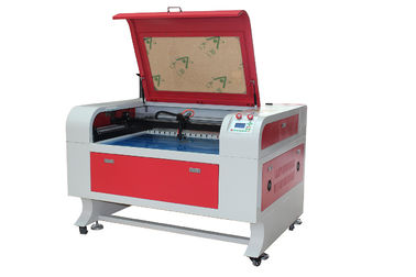 चीन Acrylic And Leather Co2 Laser Cutting Engraving Machine , Size 600 * 900mm आपूर्तिकर्ता